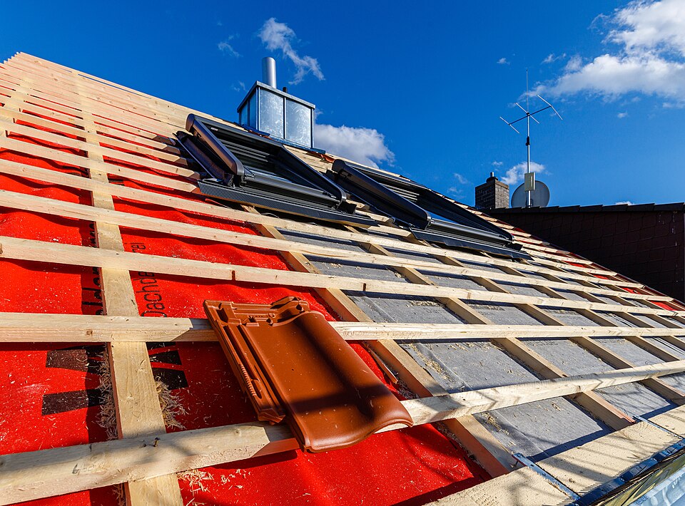 Réfection tuiles — 140 m²